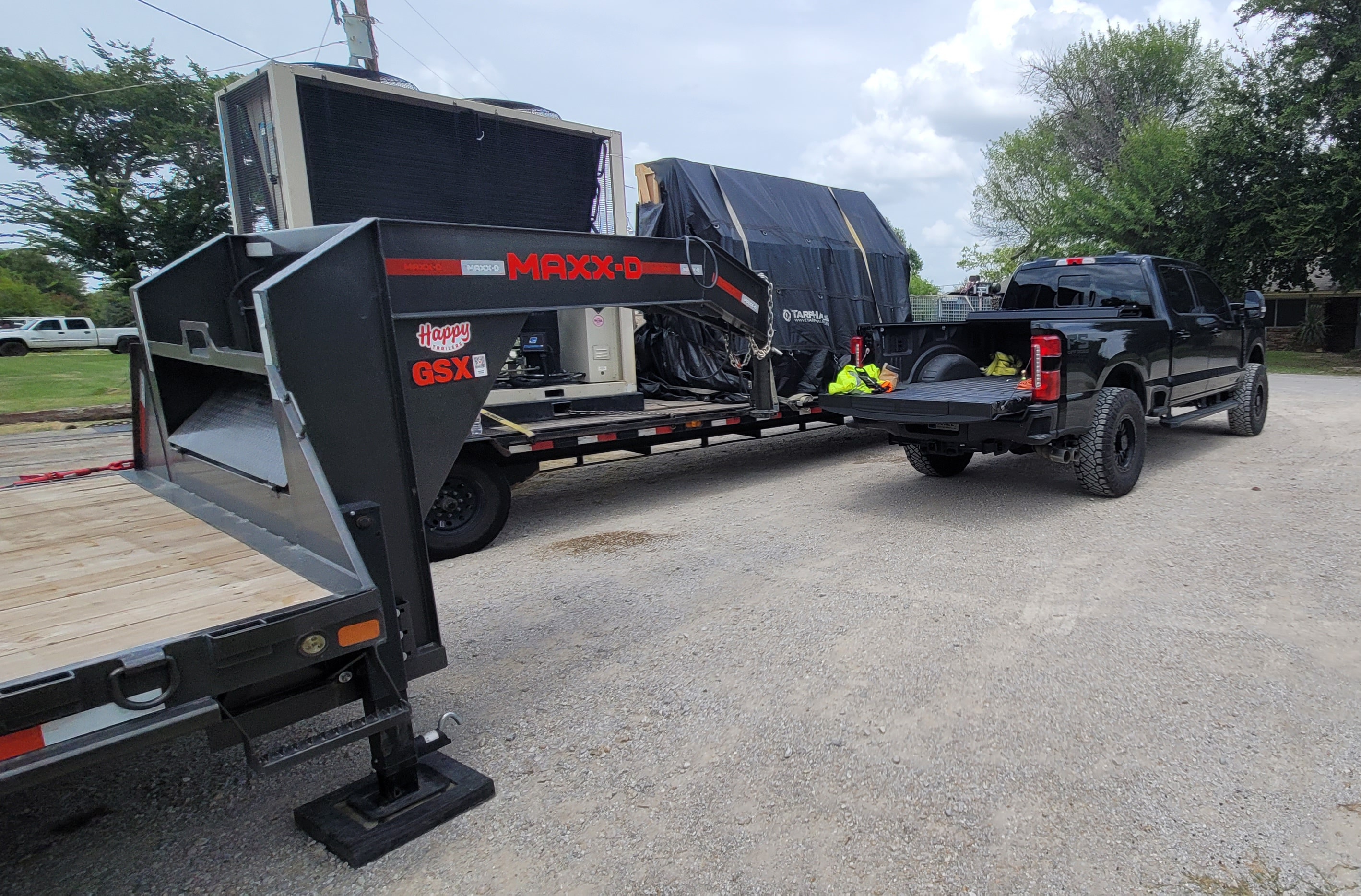 MAXX-D gooseneck trailer loaded with HVAC equipment